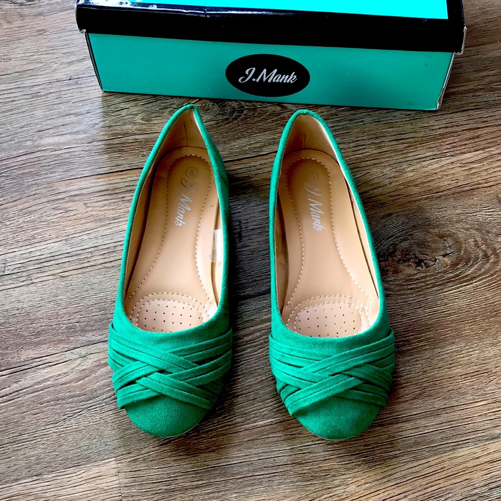 Green suede flats.